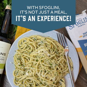 Prepared Sfoglini Bucatini pasta with herbs and olive oil on a dish. With text  - WITH SFOGLINI, IT'S NOT JUST A MEAL, IT'S AN EXPERIENCE!
