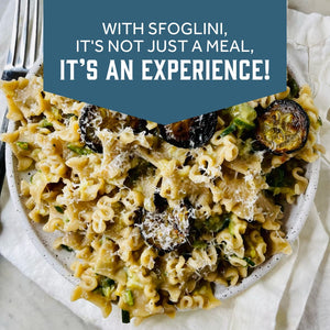Prepared Sfoglini Whole Grain Reginetti pasta with zuchini and cheese on a dish. With text  - WITH SFOGLINI, IT'S NOT JUST A MEAL, IT'S AN EXPERIENCE!