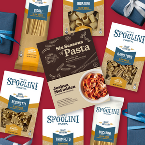 Six Seasons of Pasta Cookbook & Pasta Set - Collection of Sfoglini pasta packages on a red background with gift boxes.