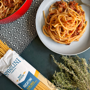 Sfoglini Organic Durum Semolina Bucatini pasta package with cooked  Bucatini with Meat Sauce Recipe